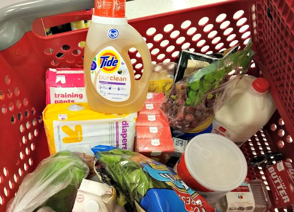 target shopping cart filled with food supplies and tide